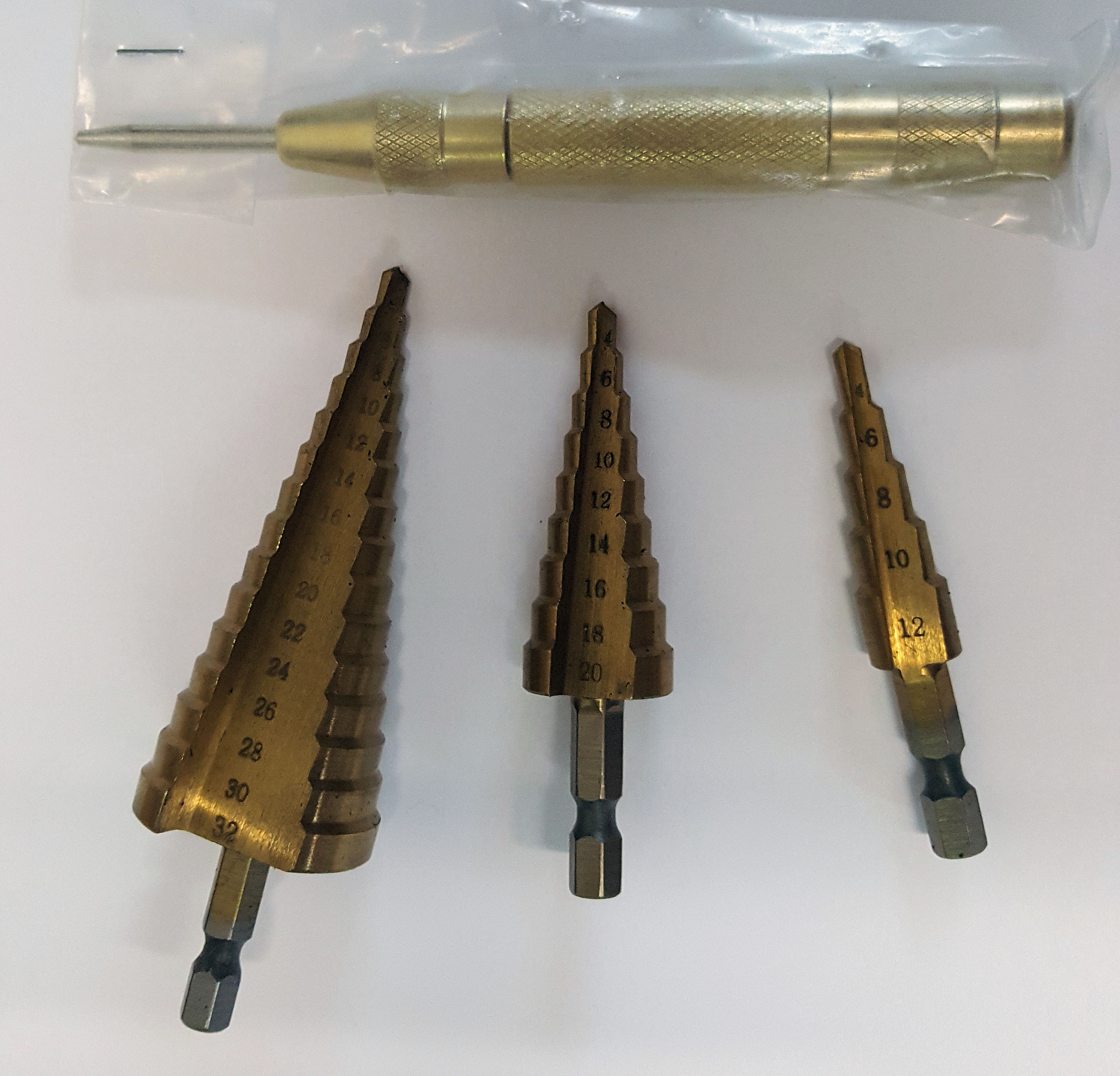 Step drills Kit including centre punch